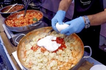 Italian Pasta 'Orecchiette' with 'Burrata' Cheese. Italy Street Food