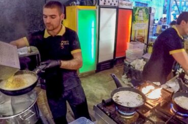 Cooking Handmade Italian Pasta. Street Food in Kiev, Ukraine
