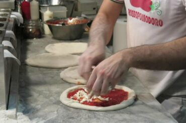 Making and Cooking a Perfect Italian Pizza, Naples Style. Italian Food seen in Italy