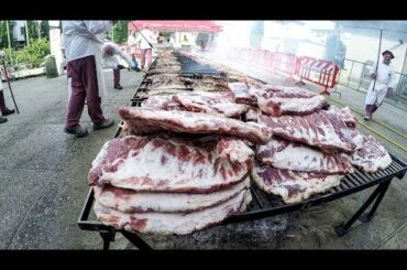 HUGE Spare Rib Grill Cooking Tons of Meat Seen in a Town Fair in Italy. Italian Street Food