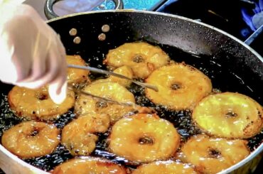 Cooking Fried Apple Pancakes. A Yummy Italian Food and Street Food