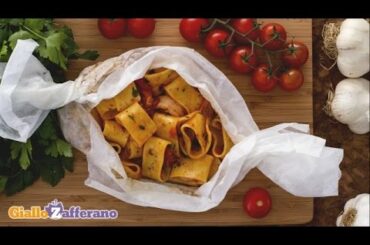 Calamarata ( pasta with squid sauce ) - Italian recipe