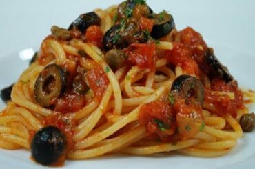 Spaghetti alla puttanesca, italian traditional recipe