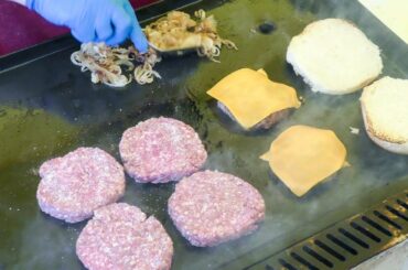 Cooking Hamburgers of Chianina Cow Beef. Italian Street Food
