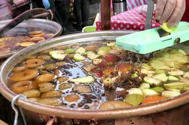 London Street Food and Drinks from Italy. Mulled Wine and Spiced Mulled Apple Juice in Brick Lane