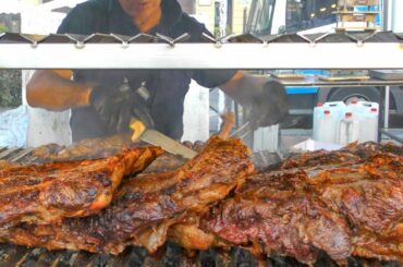 Argentina Street Food. Huge Blocks of Juicy Meat on Grill, Italy Food Fair