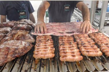 Italy Street Food. Huge Grills with Lots of Meat on Fire