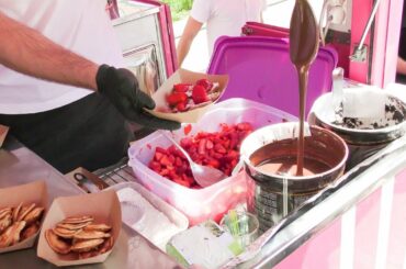 Italian Street Food. Sweet Poffertjes from Holland Tasted in Milano