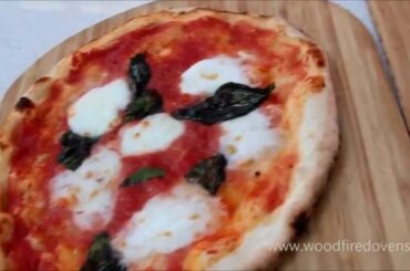 Traditional Italian Wood Fired Pizzas Cooking in the Baby Valoriani Oven