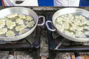 Fried Pancakes of Corn and Leeks. Italian Cuisine on the Street