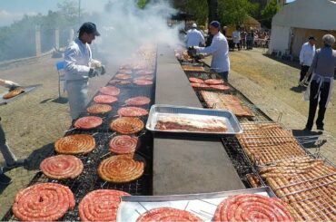 Huge Italian Street Food Festival of Grilled Meat. Ribs, Sausages, Chicken and More Meat