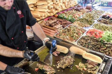 Huge Superloaded Sandwiches with Juicy Sausages. Italy Street Food from Sicily