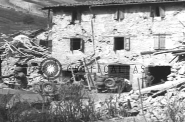 Members of the Italian Alpinieri Brigade serve wine to the soldiers as they pass ...HD Stock Footage