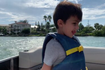 Boating, dolphins, and sharks teeth on Snake Island in Laurel, Florida near Venice