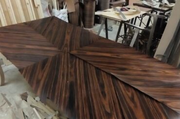 applying layer of industrial veneer on dining table