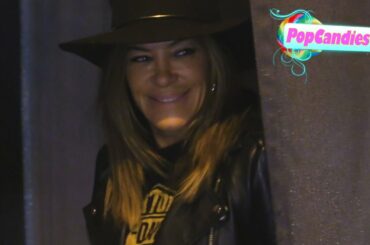 Robin Antin enjoys rainy night with friends & Italian cuisine departing Craig's WeHo