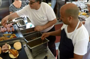 Italian Street Food. Handmade Piadine, Sausages and Peppers on Grill