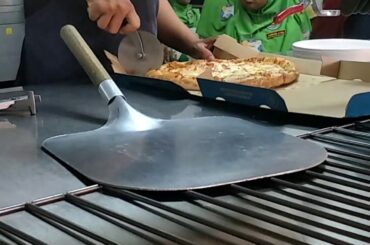 cutting pizza