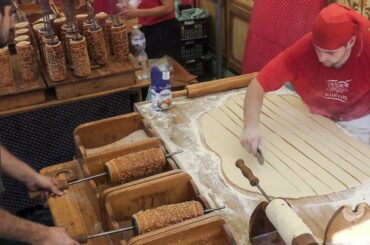 Sweets from Hungary and Holland. Kurtos Kalacs and Poffertjes. Italy Street Food Fair