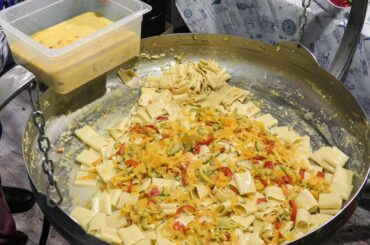 Pepper Street Food Festival Seen in italy. Huge Pepper Pasta Cooked on the Road