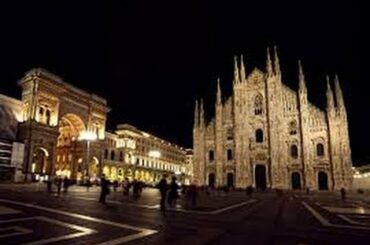EXPLORING MILAN: The magnificent Duomo (Cathedral) on a rainy night, Italy