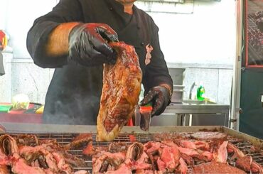 Huge Blocks of Angus, Tenderloin Beef. Meat on Grill American Style. Street Food Fair in Italy