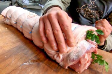 Italian Stuffed Fat Pork Belly. Preparing "Porchetta" and More Butchers at Work. London Street Food