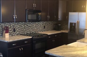 BIG LIVING IN LITTLE ITALY Tom Becka Real Estate