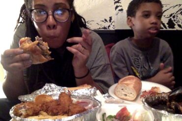 Ms Lil Big Appetite eating up an Italian Cheeseburger