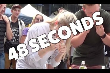 Girl Destroys Sausage Eating Contest!