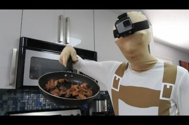 Man cooks Dollar Tree chicken in morphsuit