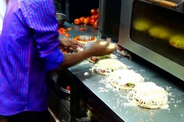 Special Cheese Pizza - Very Popular Street Food of Mumbai, Maharastra, India.