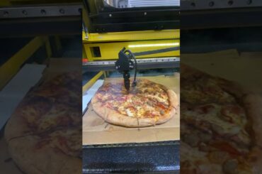Laser cutting a pizza
