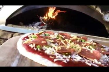 Fired hot and steaming pizza on a chilly winter day up on the mountain