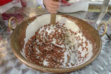 Italy Street Food. Making by Hand Sweet Almond Nougat from Sardinia