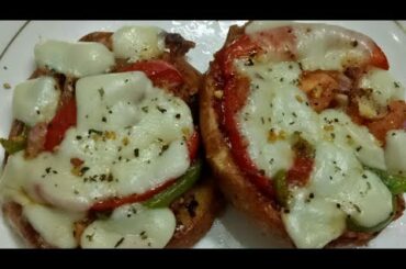 Bruschetta toasts-a must try italian recipe.  Loaded with cheese.  एक बार बनाना त्ताे बनत्ता है।