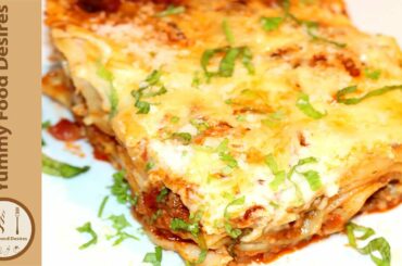 How to Make ultimate comfort food Italian Lasagna with layers of rich meat, creamy béchamel sauce.