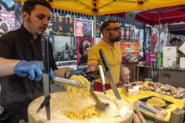 Italian Soft Fresh Spaghetti Savoured in a Cheese Wheel. London Street Food