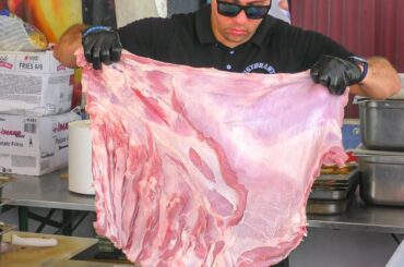 Argentinian Meat Roasted on Huge Grills. Italy Street Food Fair