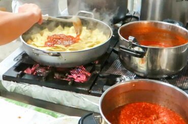 Ravioli Dumplings, Tomato and Meat Sauce, Ragù Bolognese. Italian Countryside Street Food