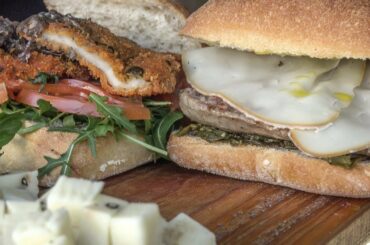 Huge Sandwich with Italian Sausages from Sicily and Cheese. London Street Food