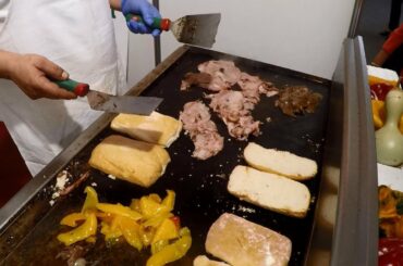 Italy Street Food. Sandwich with  Pork Roast and Pepper on Grill