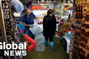Venice floods can't stop tourists from visiting stores, restaurants