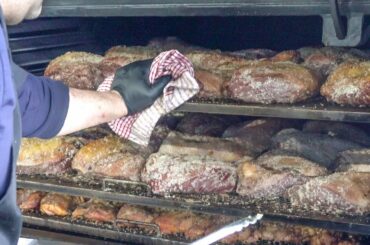 Brazil Street Food. Huge Blocks of Meat Smoked and Cooked. London