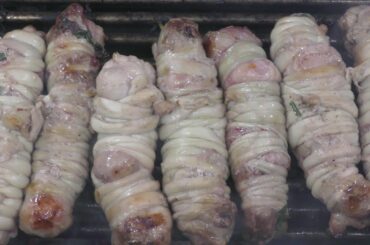 Lamb Sausages on Grill. Italy Street Food. 'Torcinelli Pugliesi'