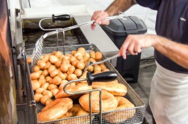 Delicious Fried Pastries from South of Italy. Krafen, Donuts and More Italian Sweet Street Food