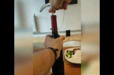 How to open a wine bottle with waiter's cork screw