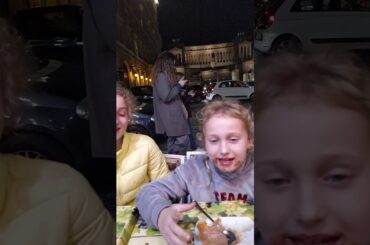 Vera and Sofia eating ice cream in Italy