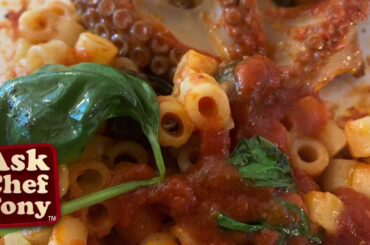 Pasta marinara with sea snails