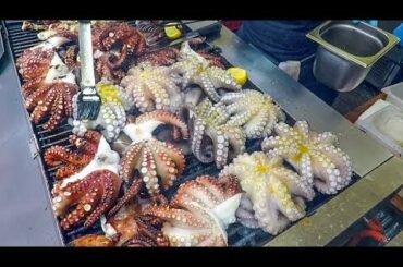 Italy Street Food. Grilled Octopus, Squid, Shrimps and Yummy Sandwich 'Puccia'